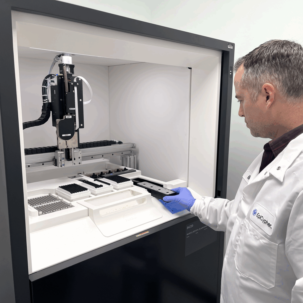 A scientist setting up a sequencing run for a Fiber-seq experiment.